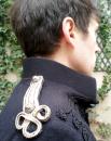 Veste à brandebourgs noirs