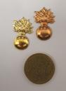 Petite grenade estampée en cuivre 25 x 15 mm - Fab. Française - L'unité