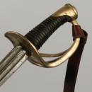 Sabre de dragon modèle 1855, modifié 1882, avec dragonne et fourreau neufs.