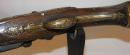 Long pistolet à garnitures argent et bronze, vers 1730
