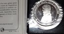 Lot de 9 pièces et médailles consacrées à l'Empire