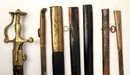 Lot de 6 fourreaux et un sabre court à l'orientale
