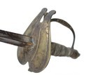 Épée d'officier modèle 1786, pommeau au bonnet phrygien. Filigrane détendu. Garde en bronze ondulée