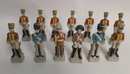 Lot de 15 figurines en biscuit, dont 2 en porcelaine.