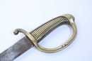 Sabre briquet, marqué VERSAILLES, sans fourreau. Lame légèrement raccourcie