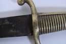 Sabre briquet, marqué VERSAILLES, avec fourreau neuf. Poinçons Empire sur garde (1807-1809)