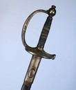 Épée d'officier subalterne, modèle 1857, clavier à l'aigle déployé, fourreau sans bouterole.