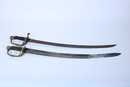 Lot de 2 sabres modèle 1821 . Très bien pour escrime ou spectacle, vendus en 30 mn!