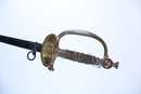 Épée d'officier du service de santé 2. Filigrane détendu (manques) . Bouton poussoir fonctionnel. Modèle 1855 transformé en 1872. 3 ème rep.