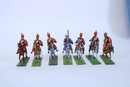 Lot de 7 Chasseurs à cheval de la garde, chevaux en plastique et cavaliers en plomb. 