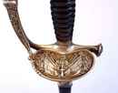 Épée à ciselures d'officier de marine, 3 ème république. Fourreau d'origine, cuir et laiton.