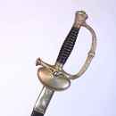 Épée à ciselures d'officier de marine, 3 ème république. Fourreau d'origine, cuir et laiton.
