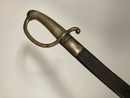 Sabre briquet, poignée marquée VERSAILLES, avec fourreau ancien à chape à pont.