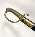 Sabre briquet modèle Empire, avec fourreau neuf. 36 sur la garde