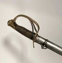 Sabre d'officier de cavalerie légère, modèle 1822 modifié 1882, lame courbe nickelée. Fourbisseur Petitfils et Bailhache.