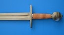 Épée une main -XIème, XIIème- Pommeau circulaire légèrement bombé, Quillon section carrée