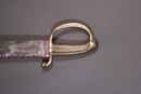 Sabre briquet, marqué Versailles, à lame à dents de scie. 