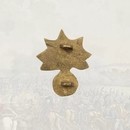Grenade en laiton flamme stylisée 32 x 38 mm