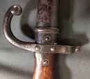Baionette pour fusil gras. Ancre sur la croisière. Fourreau un peu oxydé. Très bien par ailleurs