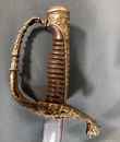 Sabre d'officier de marine. Sans fourreau, avec boucle et boucletons de ceinturon de grande tenue