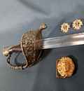 Sabre d'officier de marine. Sans fourreau, avec boucle et boucletons de ceinturon de grande tenue