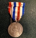 Lot de 4 médailles, dont une norvégienne.