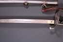 Sabre d'officier d'infanterie US à fusée cannelée, avec dragonne, style 1882 d'infanterie français.