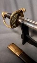 Sabre d'officier d'infanterie modèle 1845. Fourreau sans bouterole, un anneau manquant.