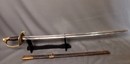 Sabre d'officier d'infanterie modèle 1845. Fourreau sans bouterole, un anneau manquant.