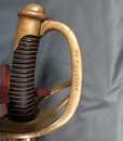 Sabre de cavalerie légère modèle 1882. Verni, lame marquée.