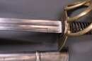 Sabre de cuirassier modèle an XIII, pointe dans le prolongement de la lame. Belle pièce d'époque.