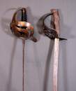 Lot de 2 sabres, dont un prussien pour l'escrime au sabre. En l'état.