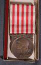 Lot de 5 médailles françaises: Médaille de la Grande Guerre, croix de guerre 14-18 et 1939, médaille militaire, médaille de l'UNC.