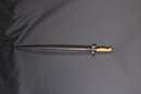 Rosalie. Baionette pour fusil Lebel. Quillon supprimé. Poignée bronze. Fourreau et garde oxydés.