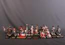 Quel roman que ma vie! Ensemble de 22 figurines sur l'incroyable trajectoire de l'Empereur Napoléon 1er.