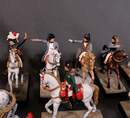 Quel roman que ma vie! Ensemble de 22 figurines sur l'incroyable trajectoire de l'Empereur Napoléon 1er.