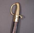 Sabre briquet, fabriqué en janvier 1813, garde poinçonnée de VERSAILLES, avec fourreau de reconstitution patiné.