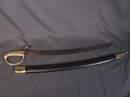 Sabre briquet, fabriqué en janvier 1813, garde poinçonnée de VERSAILLES, avec fourreau de reconstitution patiné.