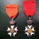  2 Croix de chevalier de la Légion d'Honneur. Second Empire. 40 x 40 mm. A restaurer