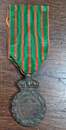 Médaille de Sainte-Hélène - Pièce originale avec ruban ancien - Exemplaire 1. 
