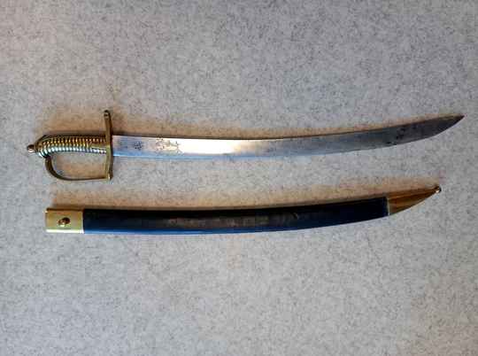 Sabre de grenadier d'infanterie modèle 1767, lame regravée, fourreau neuf.